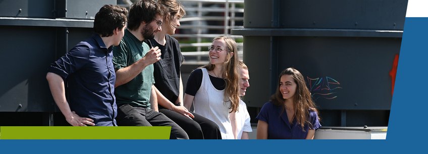 IMPRS-SPCE, Information for Applicants A group of seven young adults sitting together outdoors, engaging in conversation and smiling.
