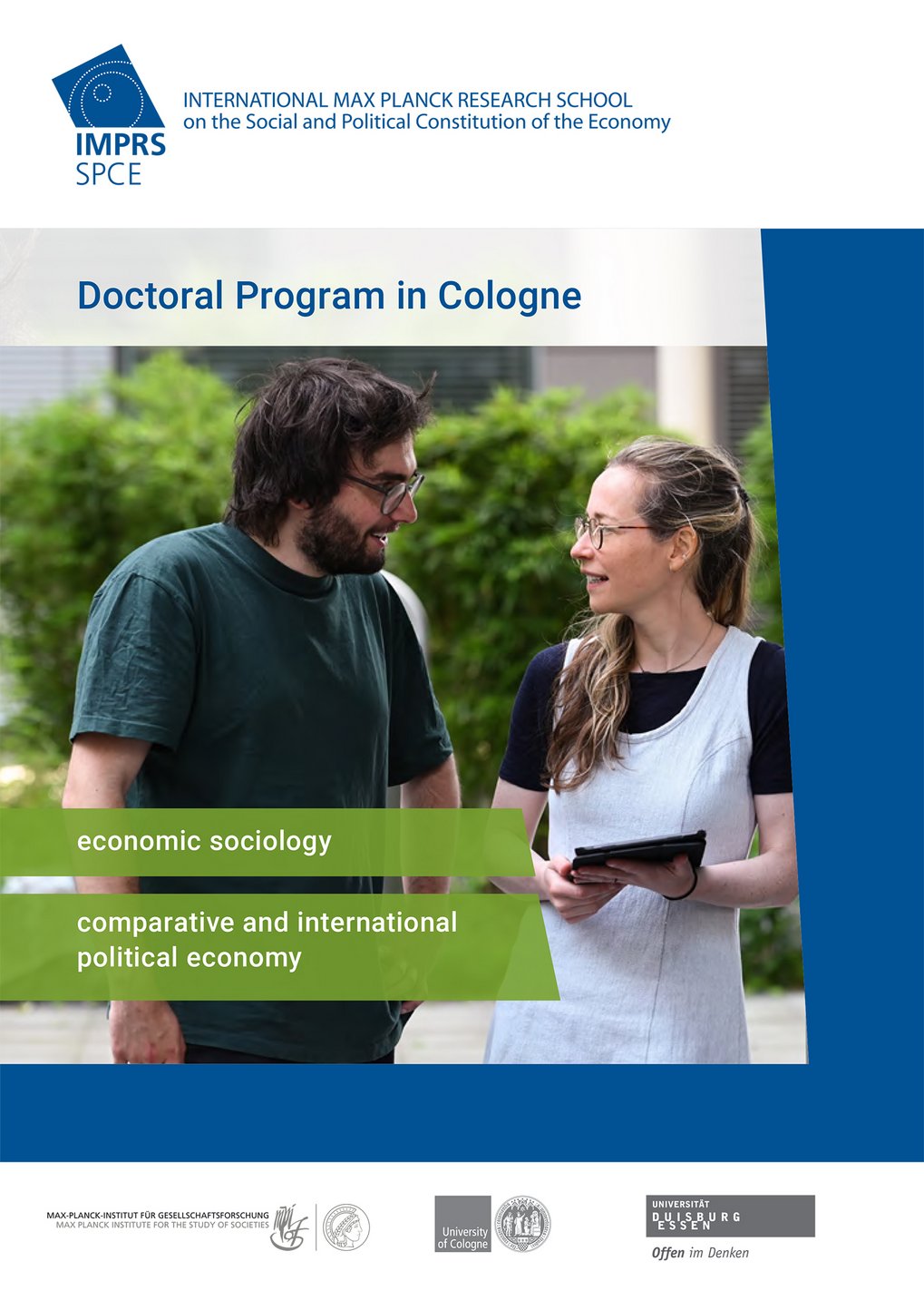 Title page of the folder of the program; a woman and a man, both doctoral students, discussing friendly, green bushes behind.